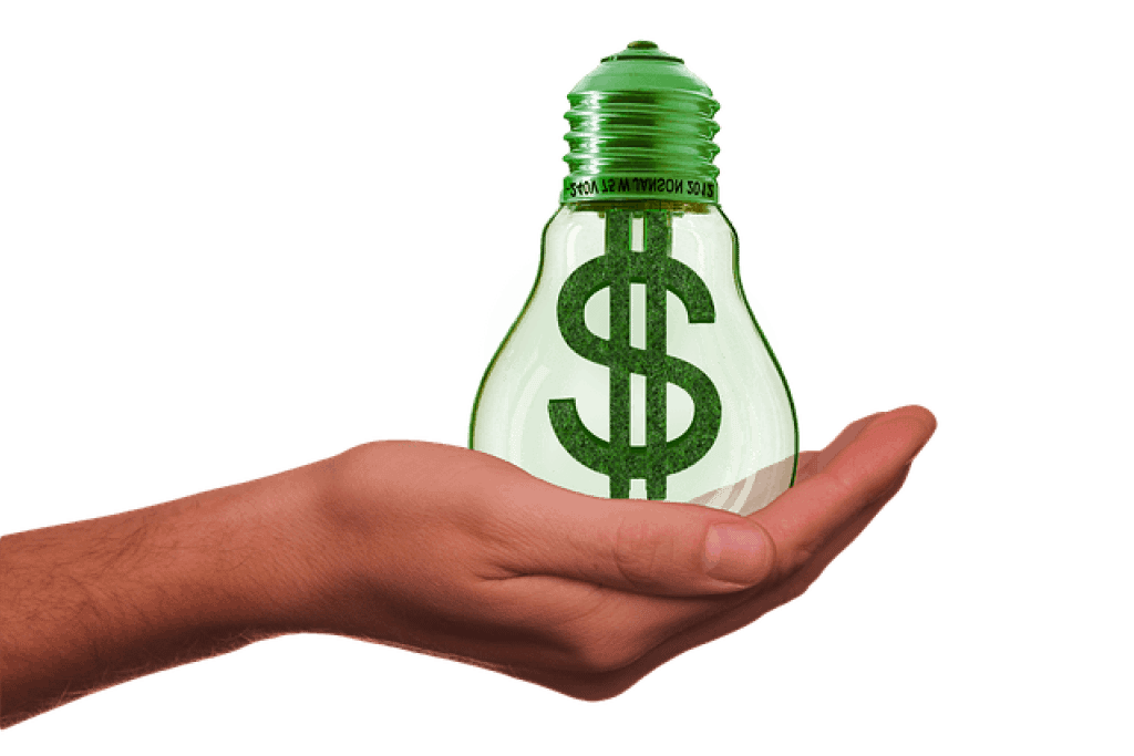 mano che sorregge una lampadina con il filamento fatto a $